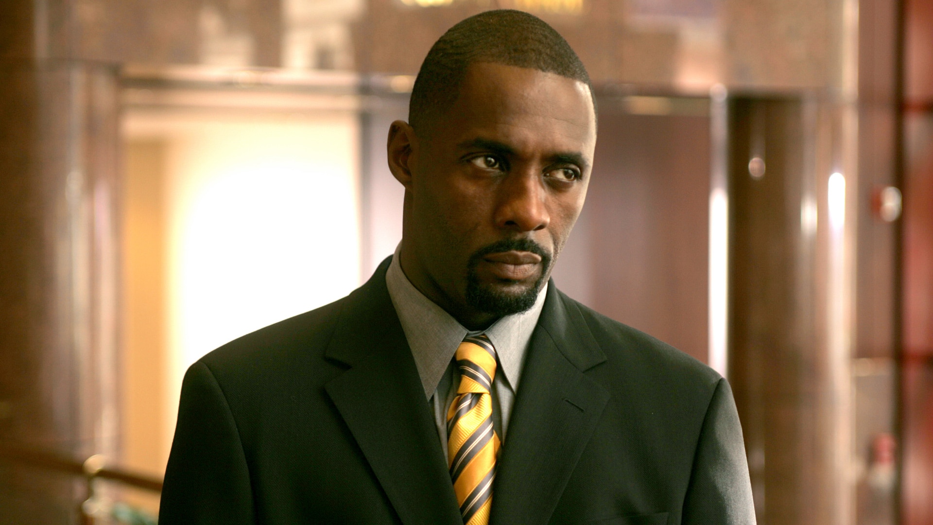 Russell "Stringer" Bell played by Idris Elba on The Wire Official