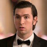 greg hirsch played by Nicholas Braun